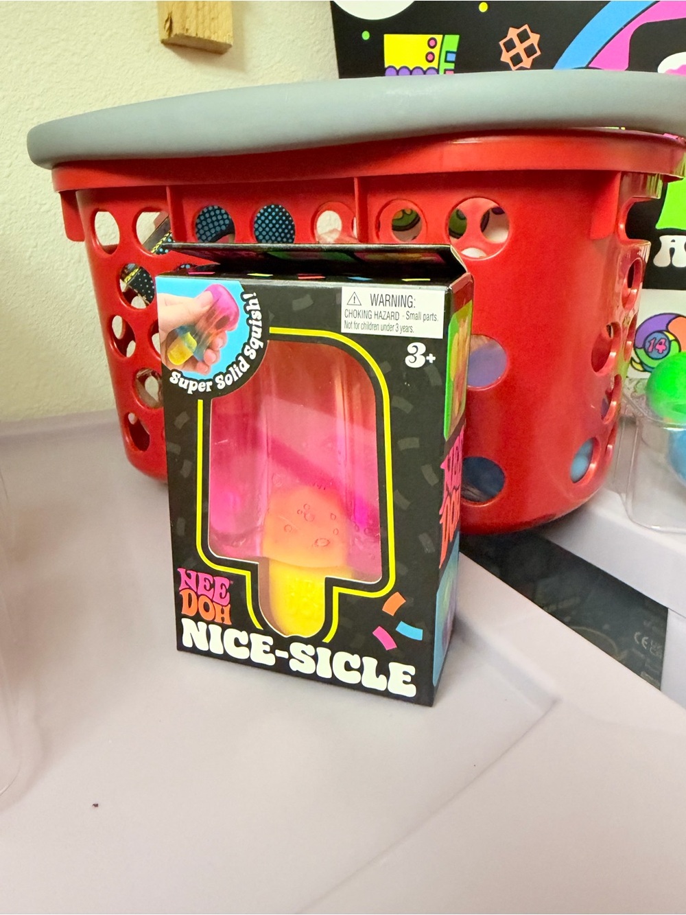 NeeDoh Nice-Sicle Squishy Toy in Pink and Yellow